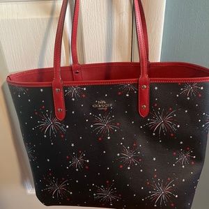 Gently used Coach reversible tote.